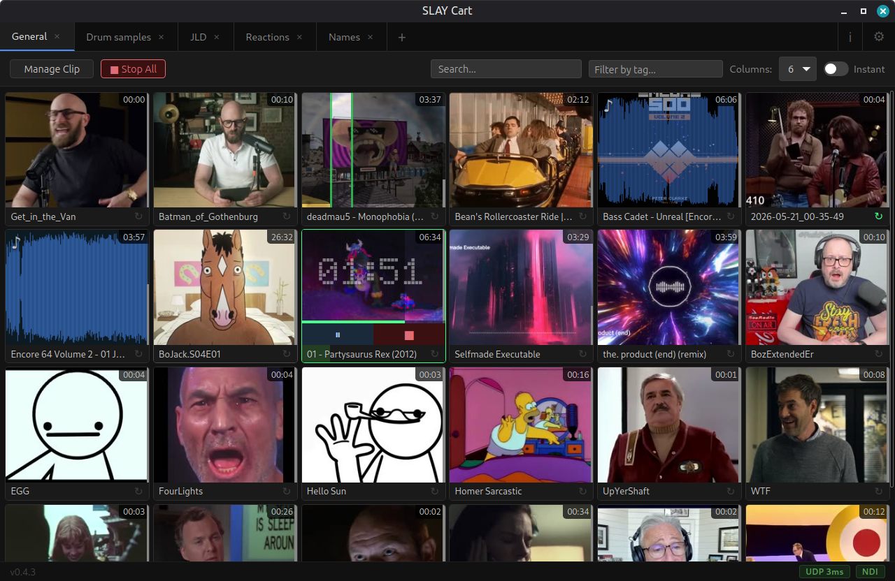 SLAY Cart: scene tabs and a touch grid of video and audio clips with live SHM, UDP and NDI output indicators.